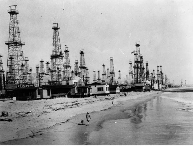 Oil derricks along the beach in Venice, California, 1920s. 
