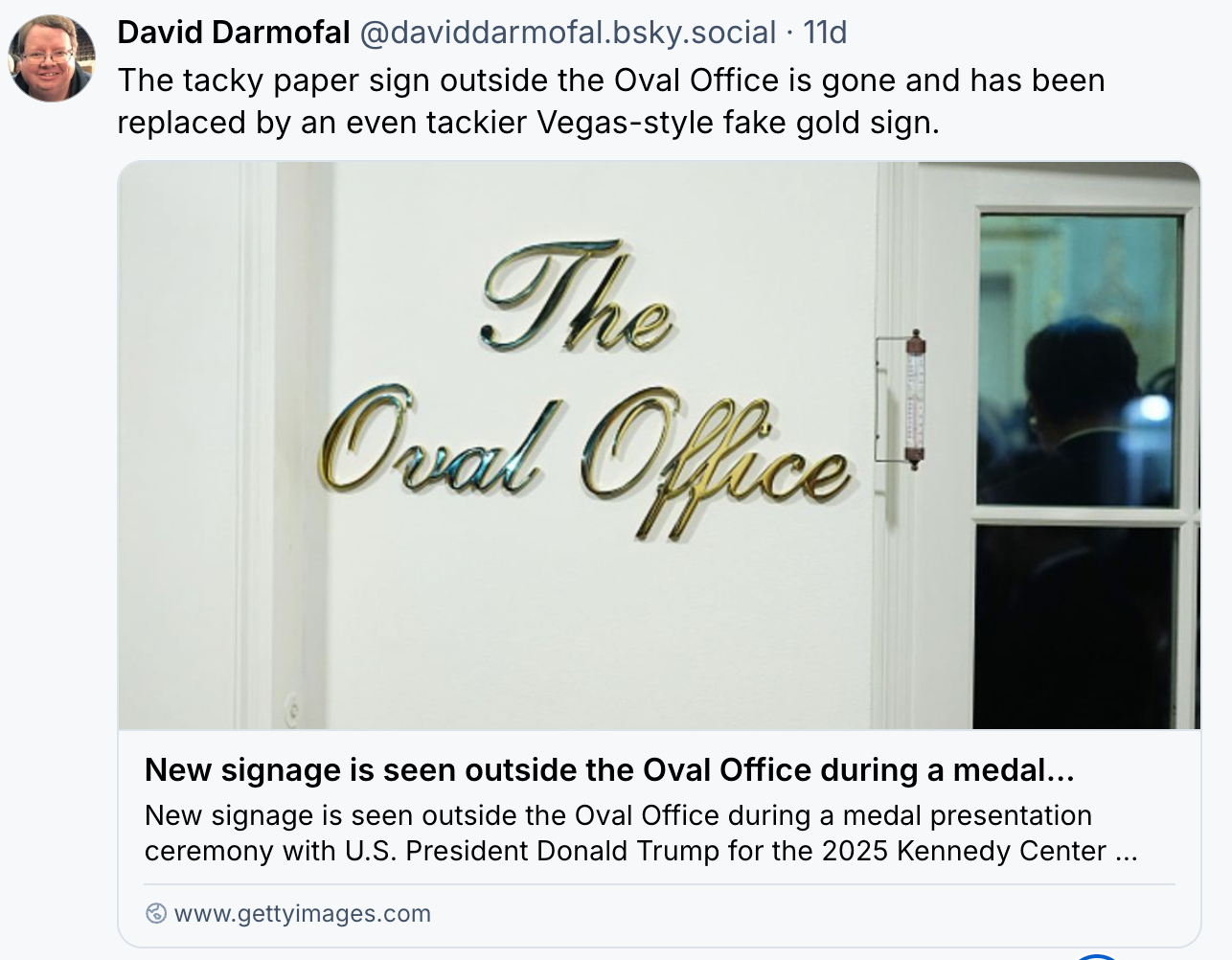 Tacky gold sign outside the Oval Office
